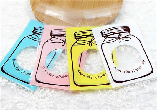 100PCS clear plastic gift bags in S and M sizes for candy, cookies, jewelry and party favors